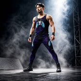 Man in gothic skull and wing print wrestling tights and tank top, dramatic dark arena lighting
