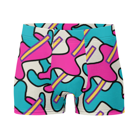 Men's patterned boxer briefs in pink, turquoise, yellow and purple curvy and stick shapes against a cream background on this men's underwear by BillingtonPix