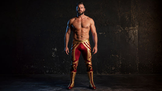 Athletic man standing front-on in full-length pro wrestling tights, shot from ankle to crown