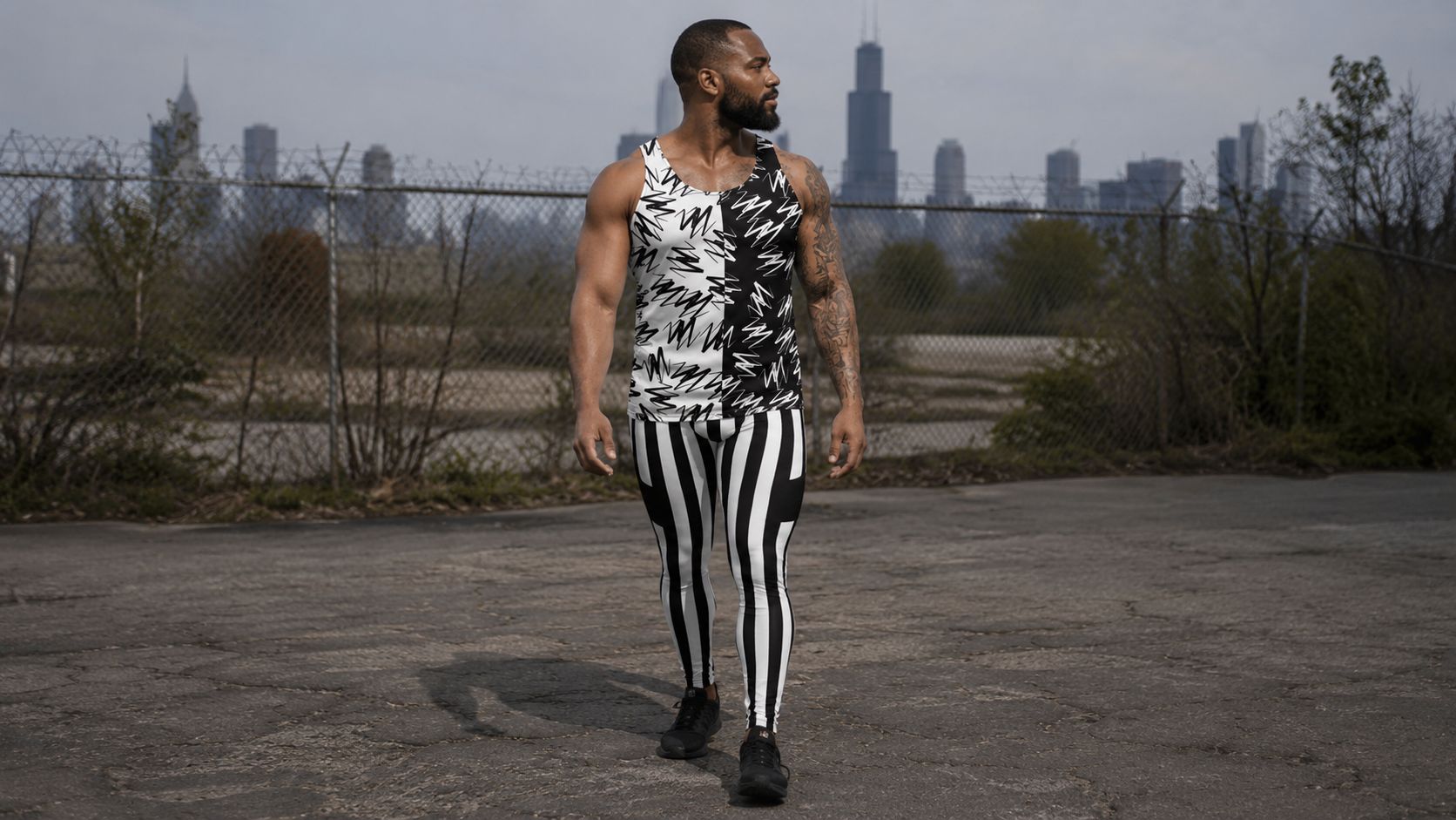 Man wearing black and white festival gear at Riot Fest