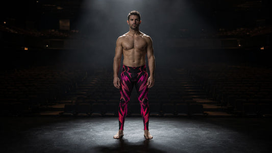 Man wearing pink and black wrestling costume