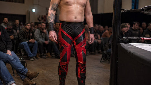 man in bold pro wrestling tights at French catch wrestling event