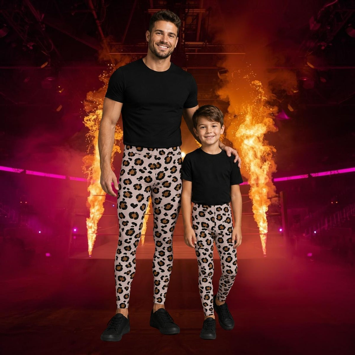 A man and a child standing together in a dark stage-like environment with dramatic orange flame effects and pink lighting. Both are wearing matching black short-sleeve t-shirts and leopard-print leggings.