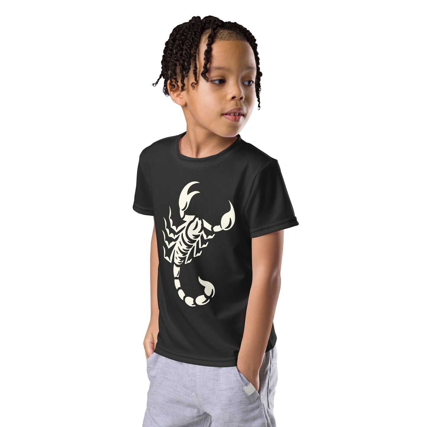 Young boy wearing dark t-shirt with large printed scorpion