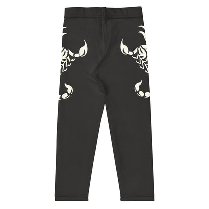 dark leggings with large printed scorpion on each side, laid flat