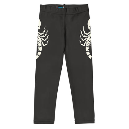 dark leggings with large printed scorpion on each side, laid flat