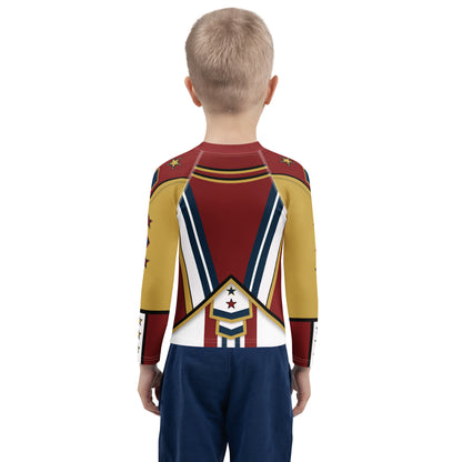 Child wearing the Drum Major kids rash guard, back view with navy stripes and star chevron