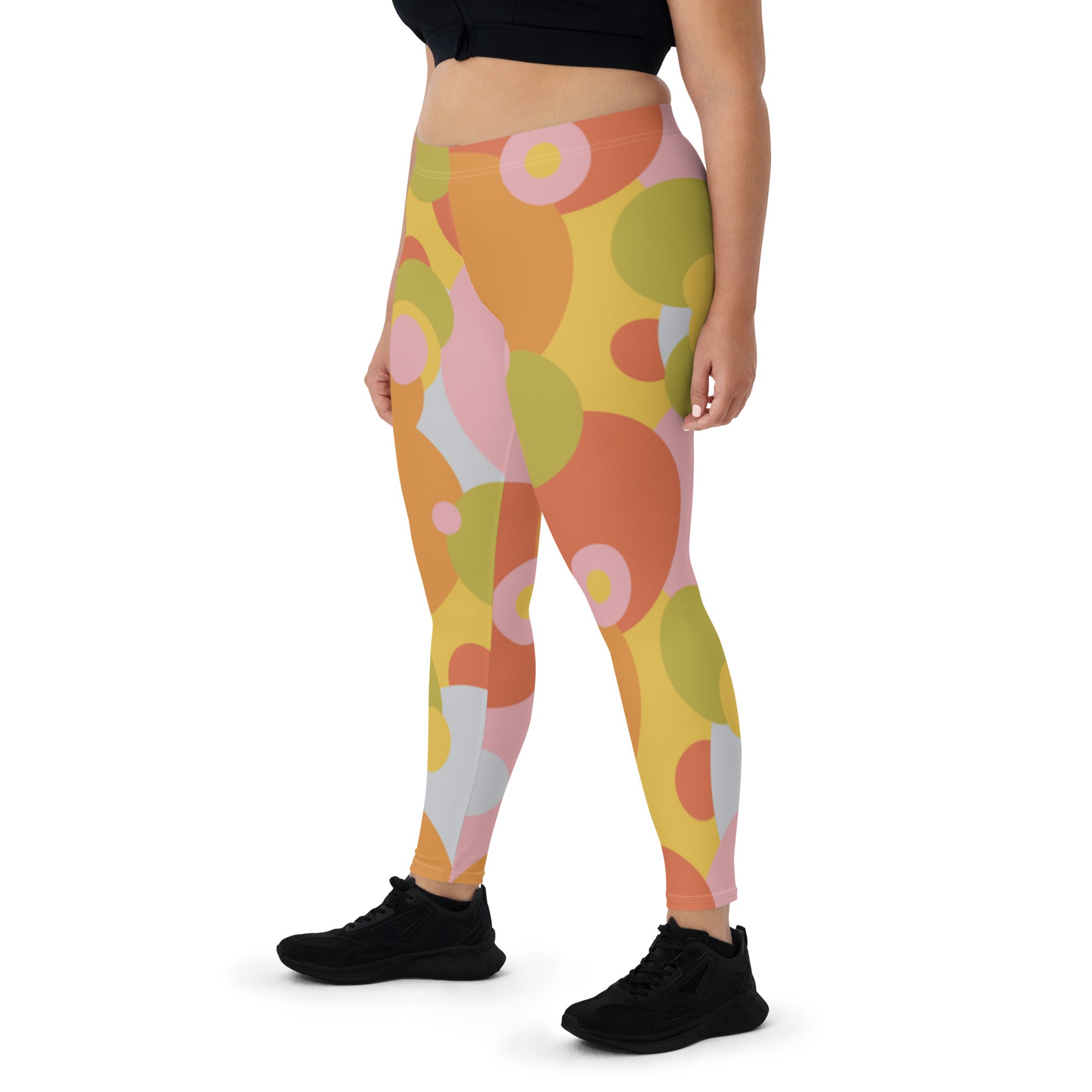 grrovy 60s style leggings for women in soft pastel tones of pink, orange, lime green. Circular geometric patterned meggs for women.