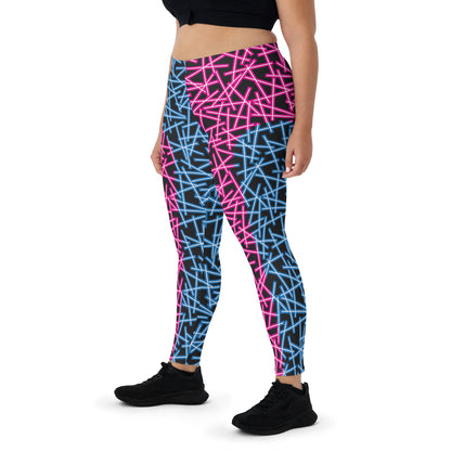 Neoncore style leggings for women with scattering pattern of neon stripes in blue and pink on these printed pro wrestling style tights. Mid rise elasticated waistband and ankle length legs in opposite colors with reverse insets.