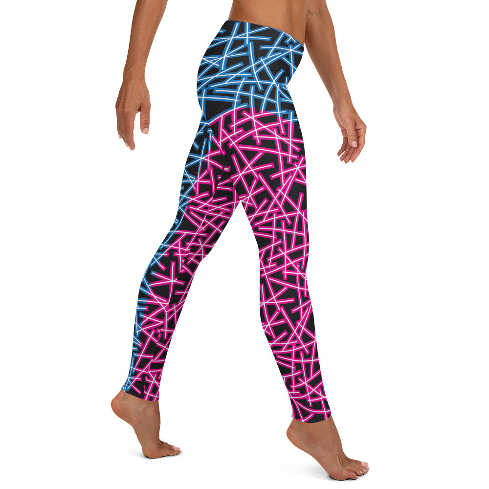 Neoncore style leggings for women with scattering pattern of neon stripes in blue and pink on these printed pro wrestling style tights. Mid rise elasticated waistband and ankle length legs in opposite colors with reverse insets.