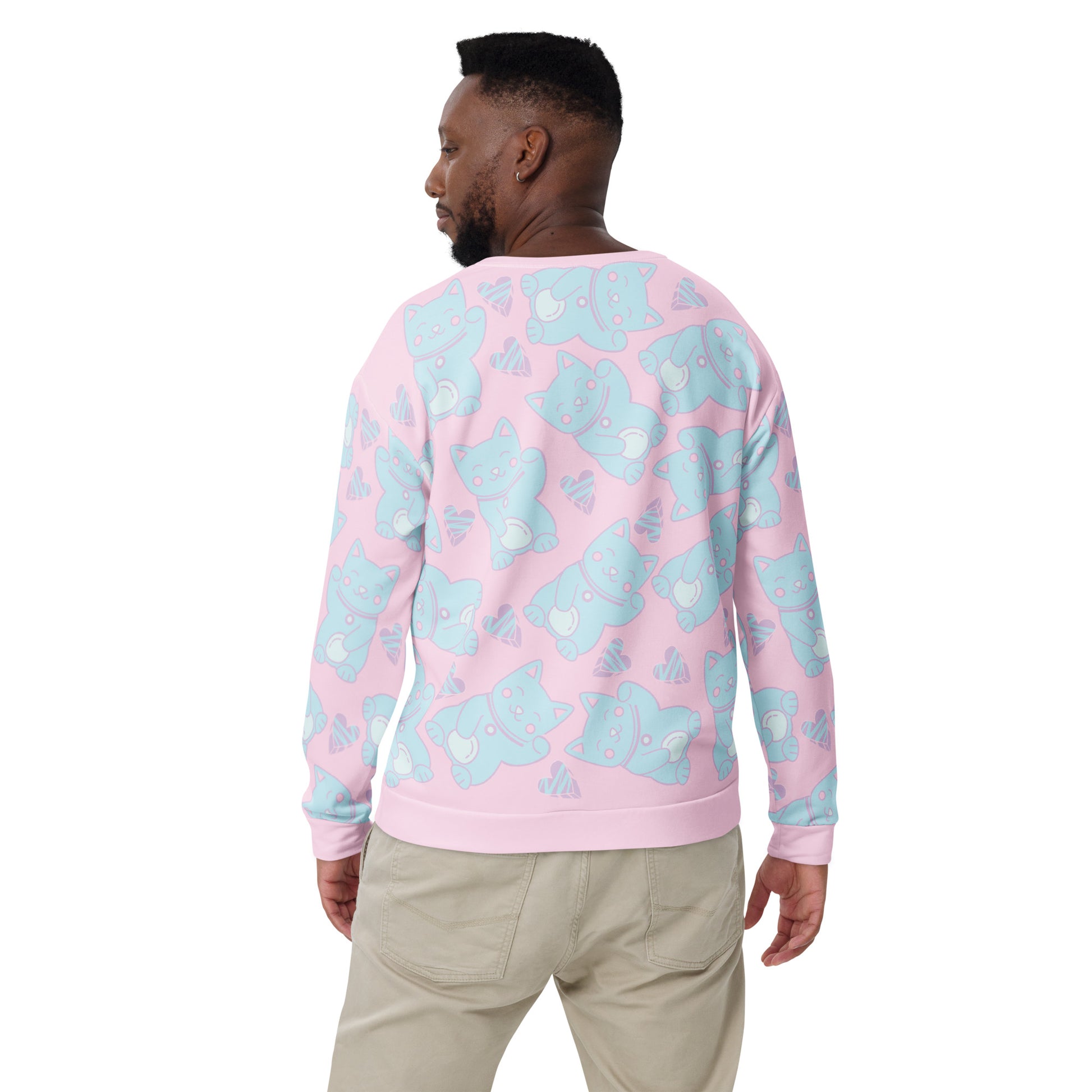 Pastel punk anime Harajuku neko cats in blue against a pink background on this sweater by BillingtonPix