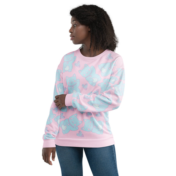 Pastel punk anime Harajuku neko cats in blue against a pink background on this sweater by BillingtonPix