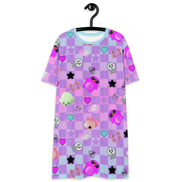 Menhera kei dress in pastel goth style with yami kawaii jfashion harajuku pattern of skulls, razor blades and sticking plasters mixed with yume kawaii cute motifs of mochi penguins, seals and mice against a pastel checked or chequered background.