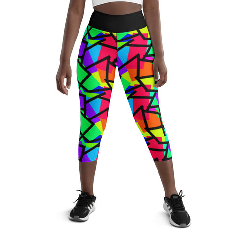 Harajuku Yume Kawaii womens yoga capri leggings in brightly coloured Pop Kei 80s Memphis design in red, orange, green, purple, yellow and turquoise geometric shapes and a black zigzag overlay on these neon funky running tights for women. High waist.