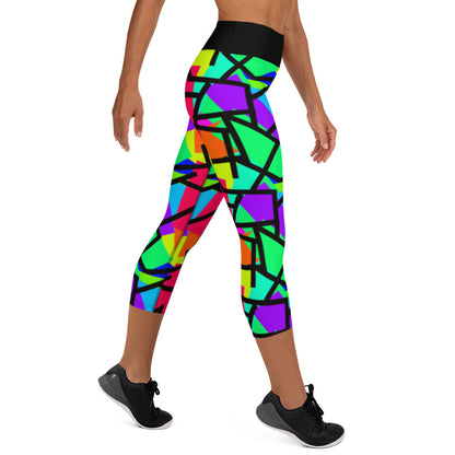 Harajuku Yume Kawaii womens yoga capri leggings in brightly coloured Pop Kei 80s Memphis design in red, orange, green, purple, yellow and turquoise geometric shapes and a black zigzag overlay on these neon funky running tights for women. High waist.