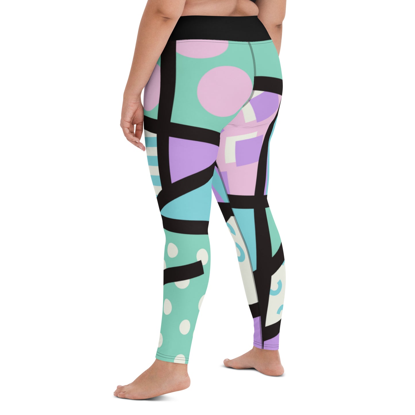 Colorful yoga leggings for women with a ankle length leg and black high waistband. Geometric shapes and pattern in a Harajuku and 80s Memphis style print. These yami kawaii printed workout leggings are beautifully designed in pastel pink, purple and green.