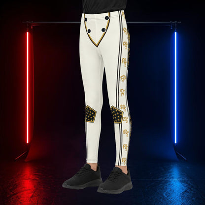 White cropped leggings with black and gold military-style trim, decorative gold motifs down the side, and black knee patches, shown on a model from the waist down against a dark studio backdrop with red and blue neon lights.
