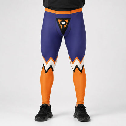 A person wearing full-length athletic leggings with a purple upper portion, orange lower portion, and white and black zigzag accents near the knees, shown against a light gray studio background.