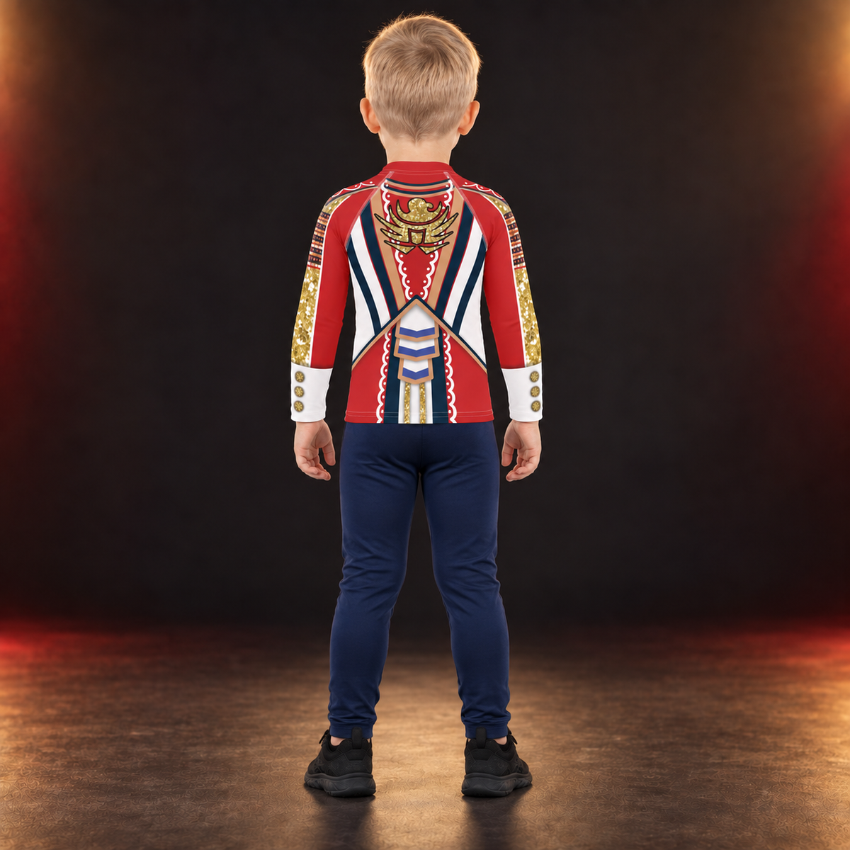 Back of the White Circus kids rash guard on a child - gold eagle emblem with navy and white chevron