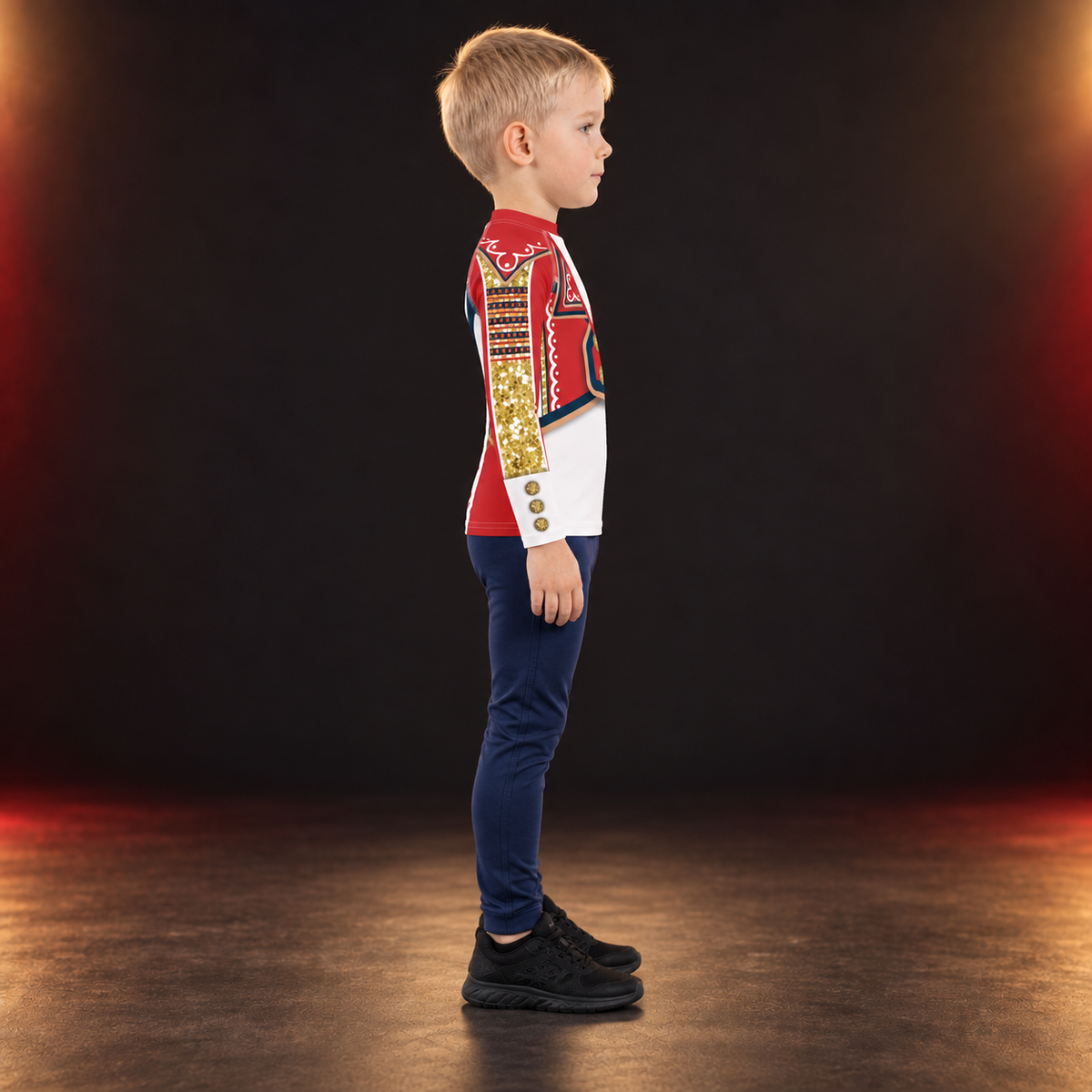 Other side of the White Circus kids wrestling rash guard, worn with navy trousers