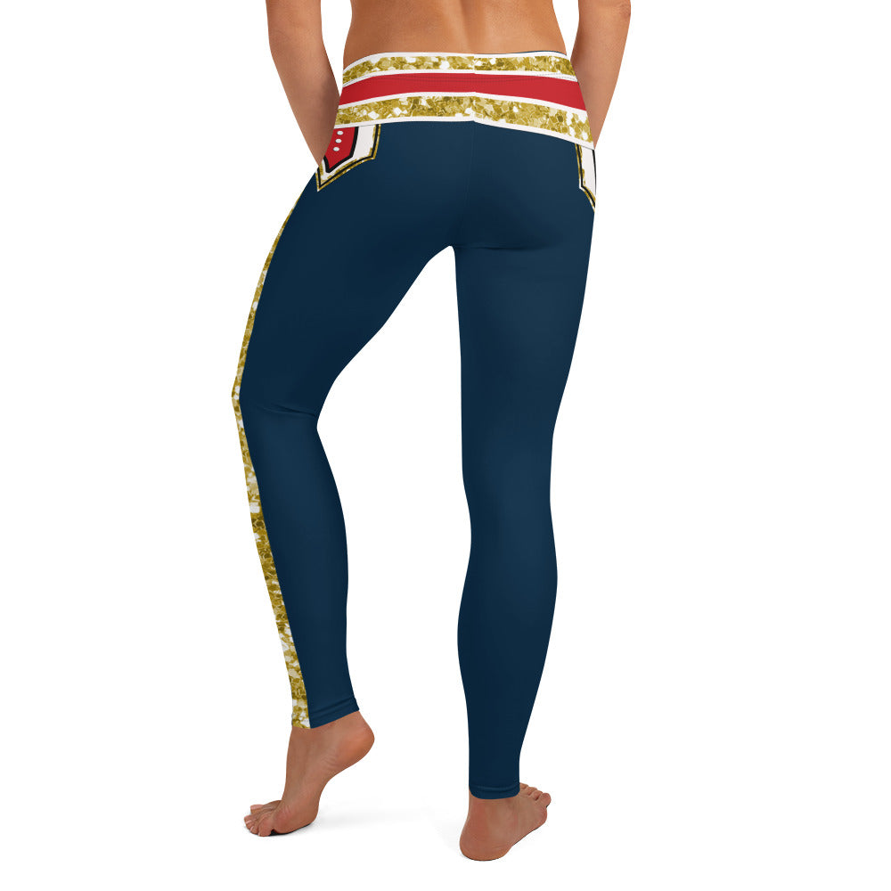 pro-wrestling style tights for women in red, blue, white and gold, printed leggings. Retro 80s cosplay halloween wwe wrestling outfit idea with red inset, ankle length legs and mid rise.