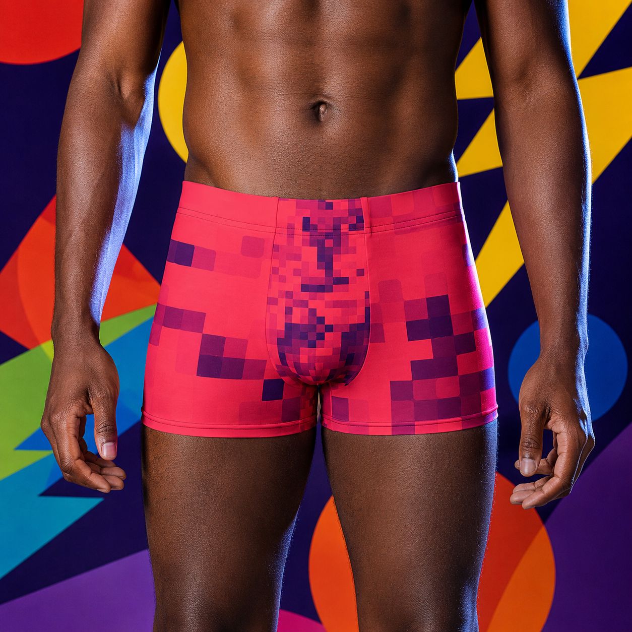 Person wearing red pixel-patterned boxer briefs underwear against a colorful abstract background