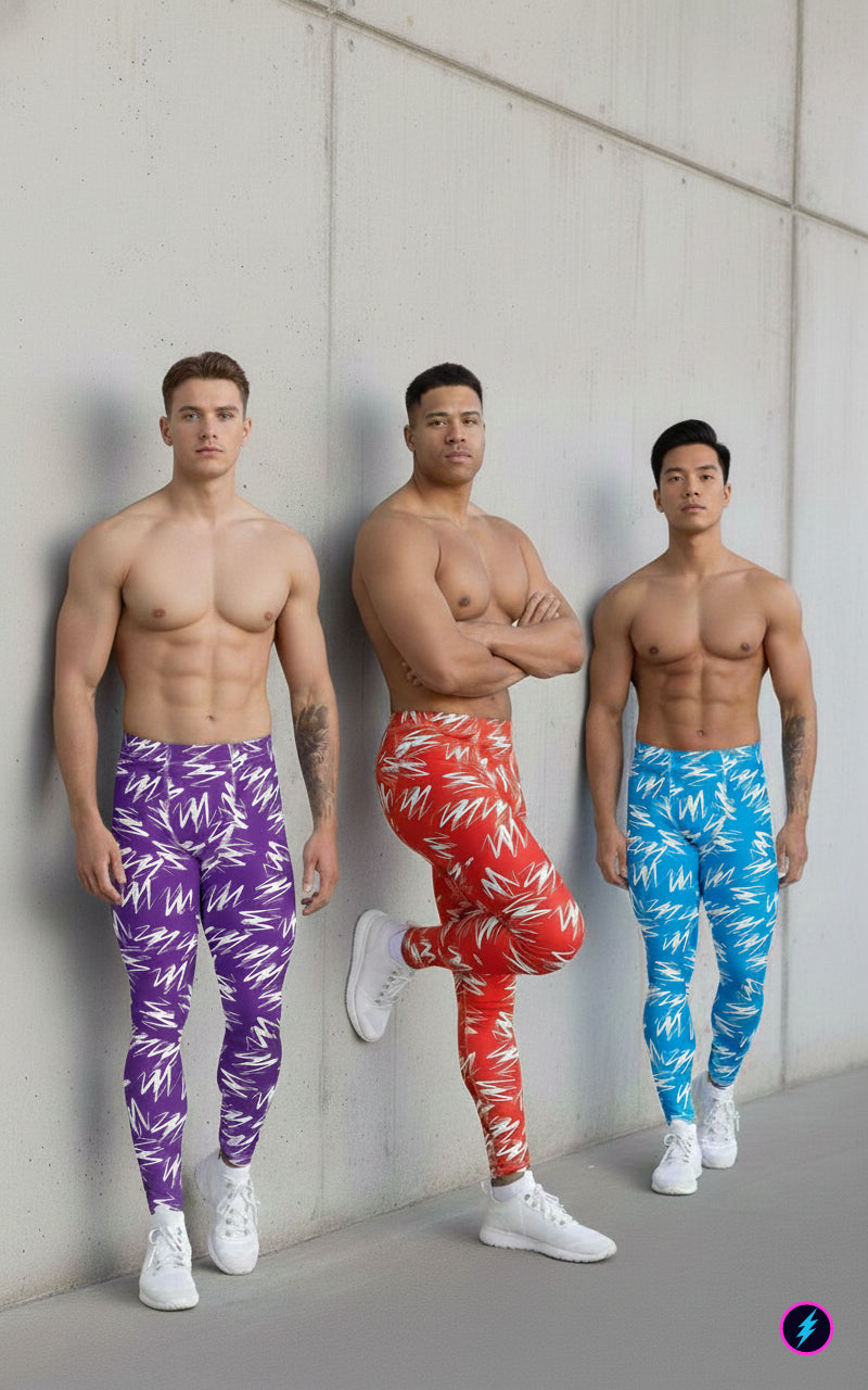 Three men wearing colorful patterned zigzag leggings against a concrete wall.