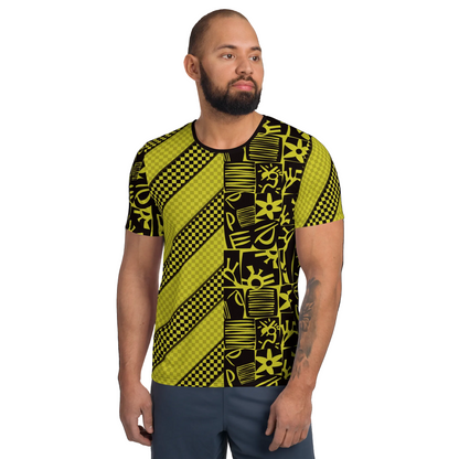 Man wearing a black and yellow patterned striped and polka dot geometric t-shirt.