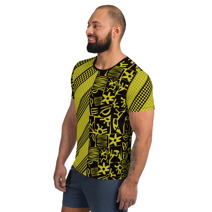 Man wearing a black and yellow patterned striped and polka dot geometric t-shirt.