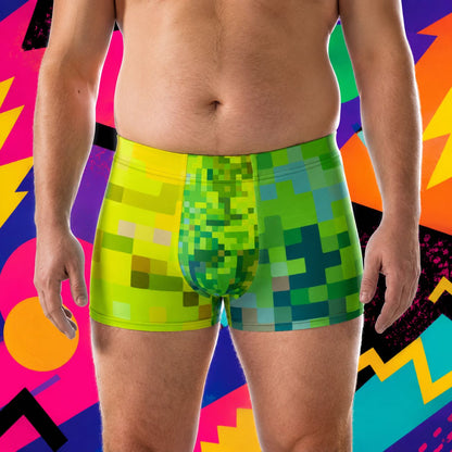 Person wearing colorful pixelated boxer briefs against a vibrant abstract background