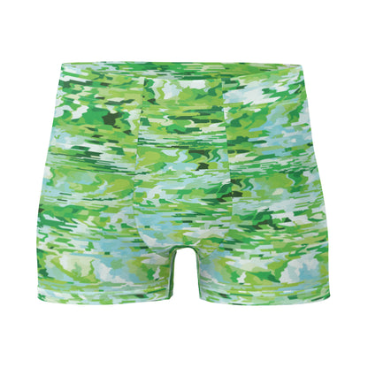 Green camouflage-patterned boxer briefs on a white background