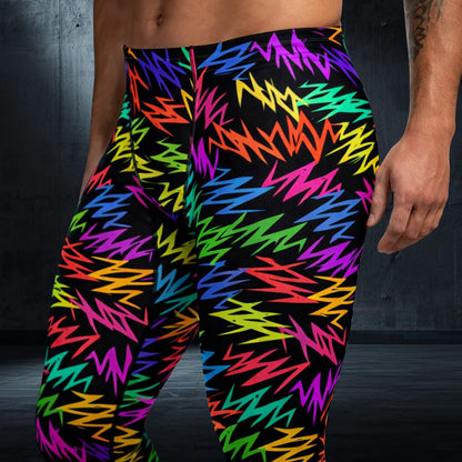 Colorful rainbow zigzag patterned bold fashion leggings on a person against a dark background