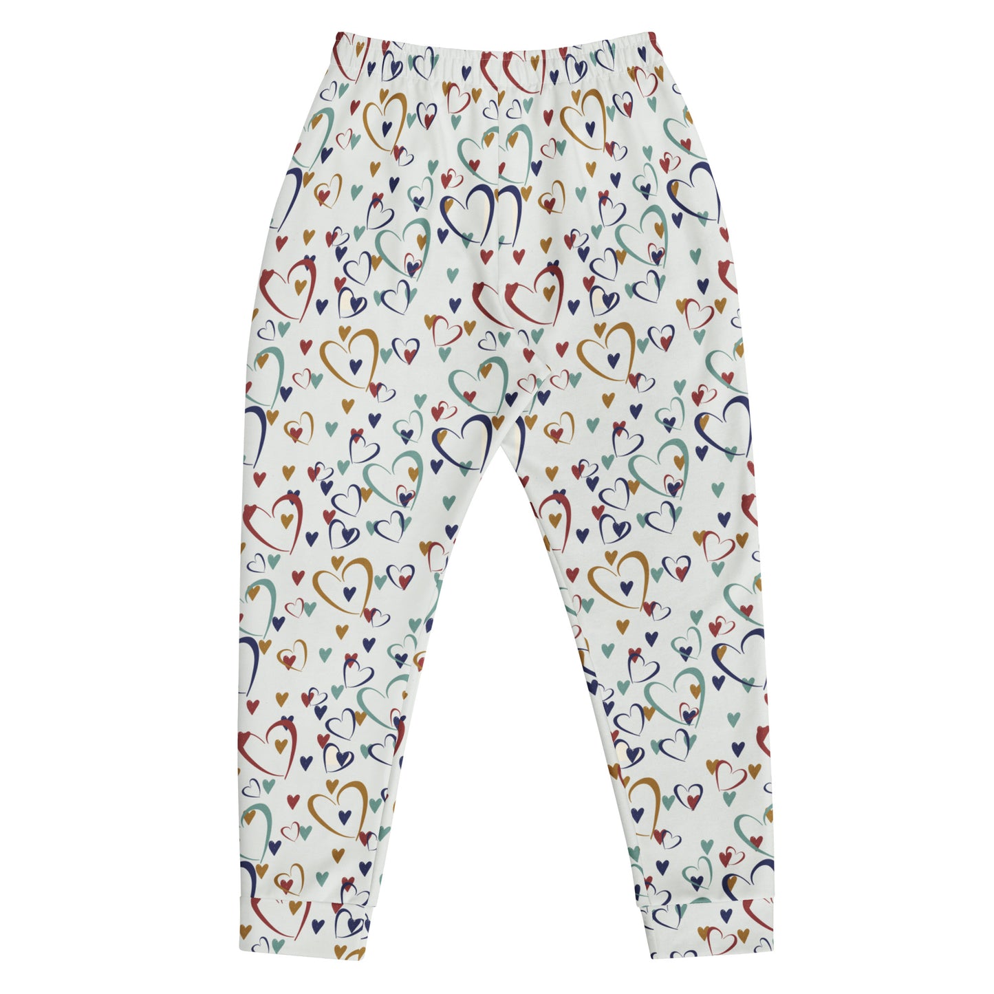 flat laid white leggings with rainbow colored hearts pattern