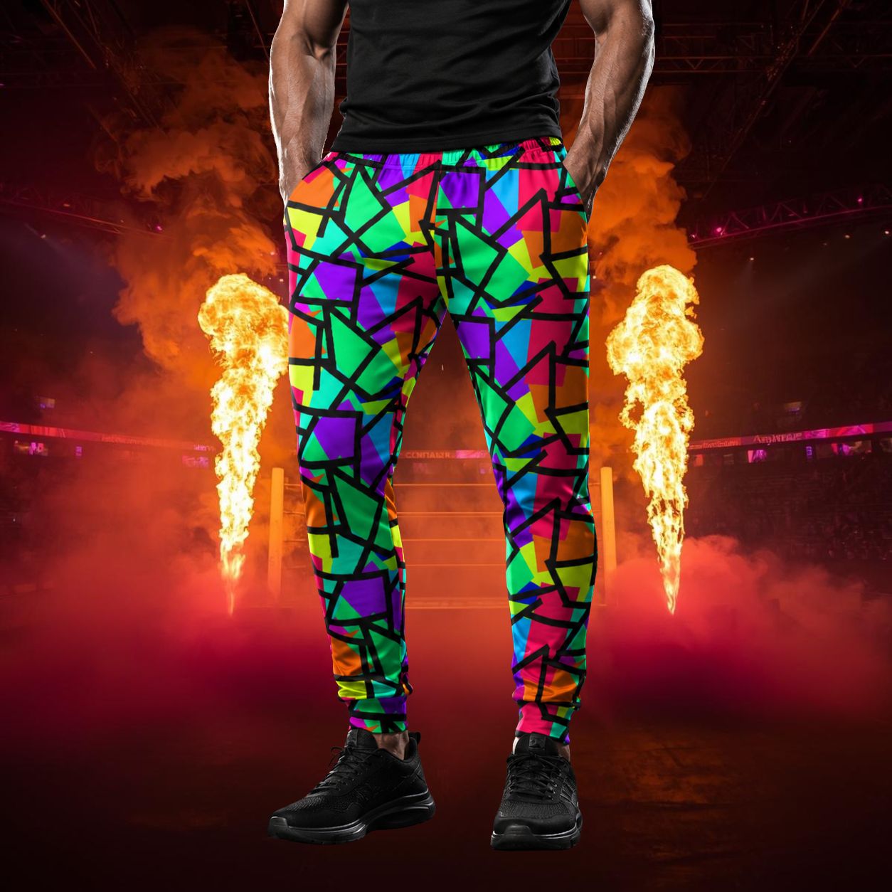 Person wearing colorful geometric-patterned jogging pants with fire performers in the background