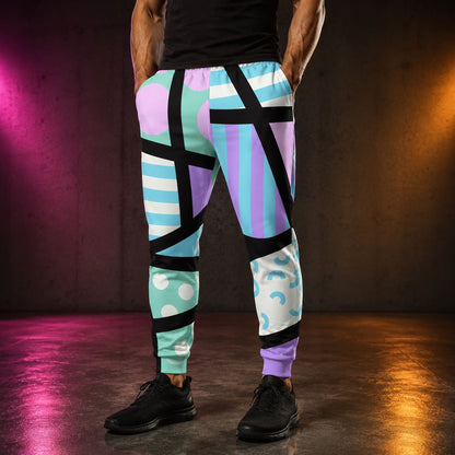 Person wearing pastel memphis patterned jogging pants with a dark background