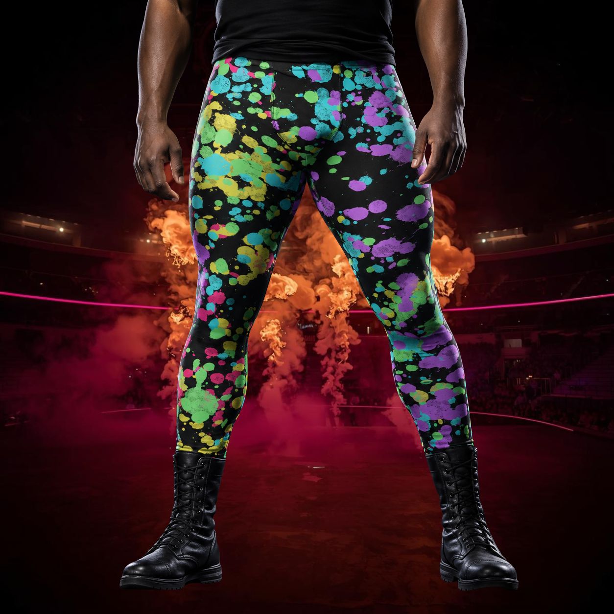 Man wearing black leggings with rainbow ink splash design in LGBT colors