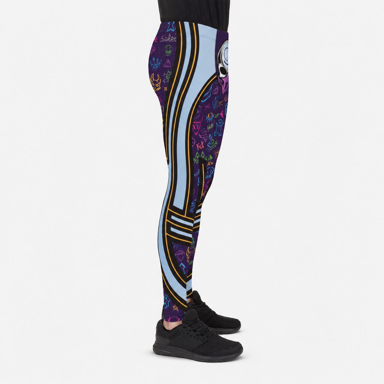 Person wearing colorful lucha libre leggings with a retro memphis design and alien motif, blue and yellow striped design on a white background