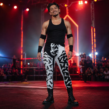 man wearing black and white leggings with front insets containing pistols in alternate colors