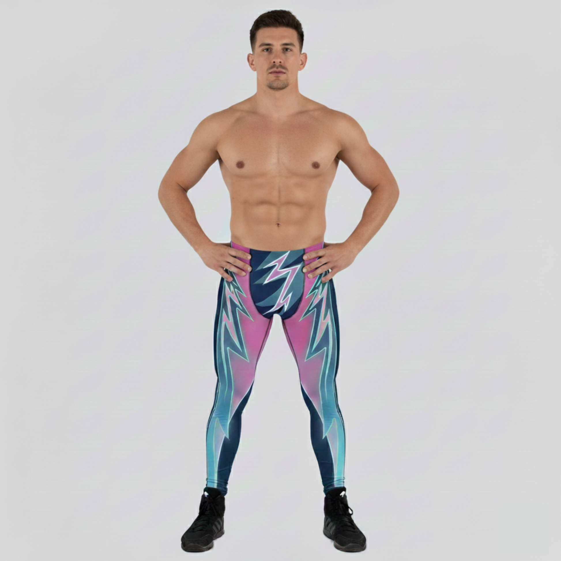 Man wearing colorful wrestling tights with a geometric pattern on a white background
