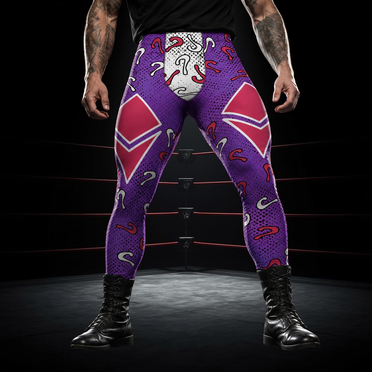man wearing luchador leggings with diamond shapes and question marks in purple, red and white in a lucha libre style