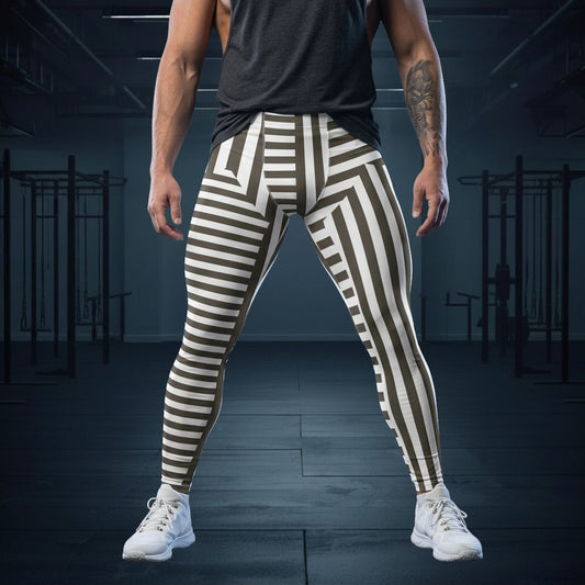Person wearing black tank top and striped leggings in a gym setting