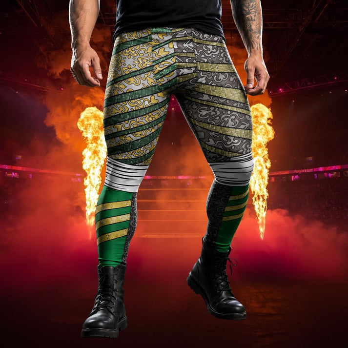 Mann trägt kräftige Wrestling-Tights in grün-goldenem Metallic-Design