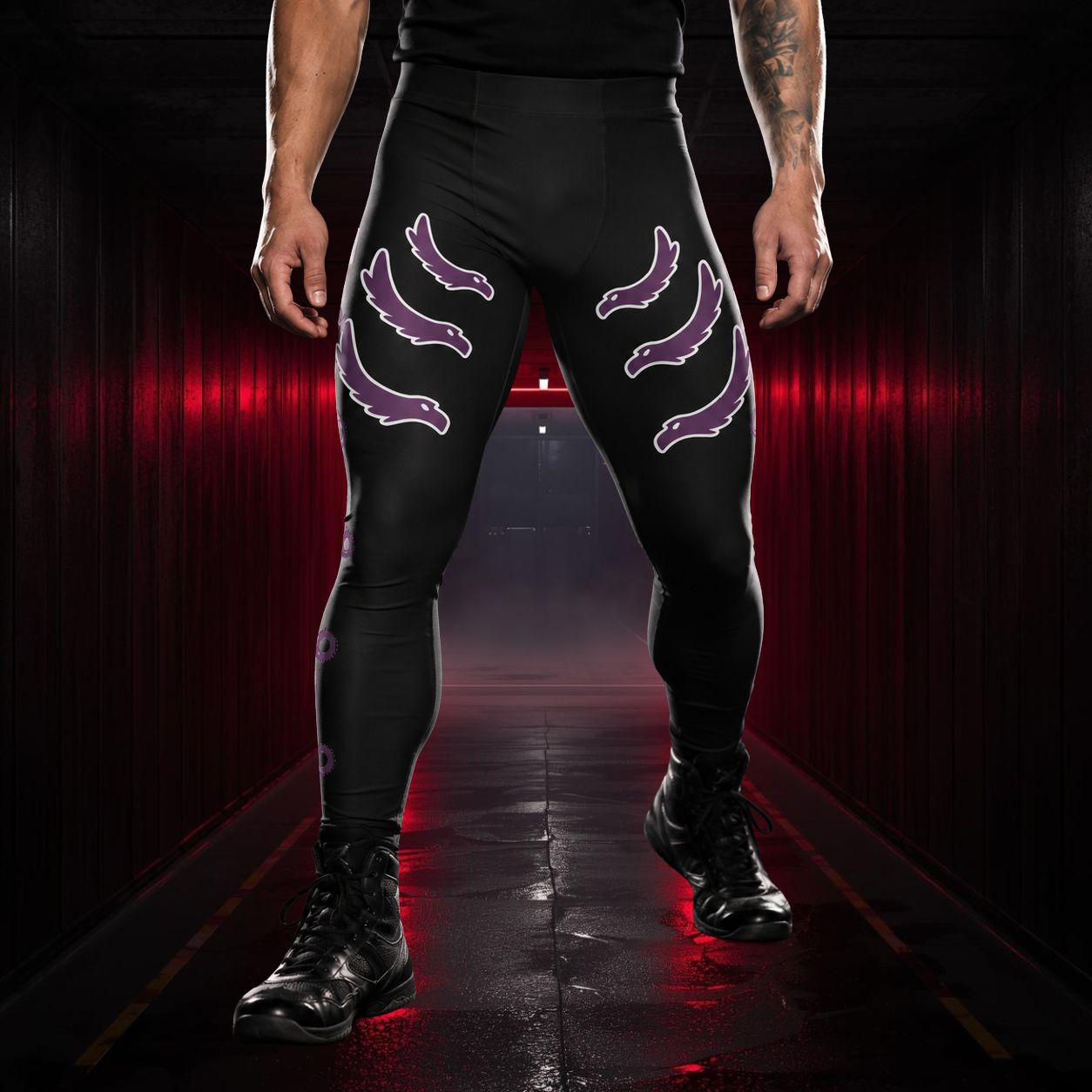 Man wearing black leggings with purple gothic bird designs
