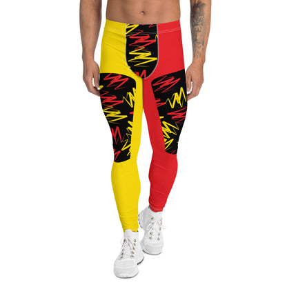 Men's pro wrestling tights in yellow and orange zigzags in alternative insets on each ankle length leg. Mid rise waistband, elasticated. Vibrant fashion meggings, rave outfit, festival gear.