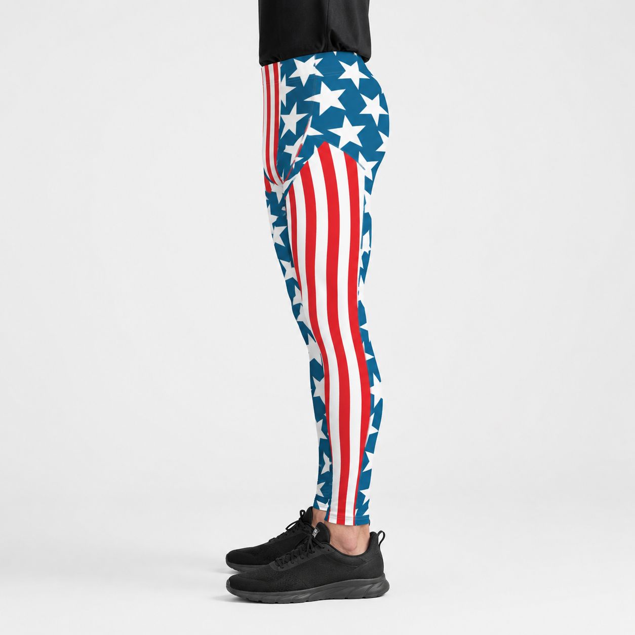 Leggings with American flag pattern worn by a person on a white background