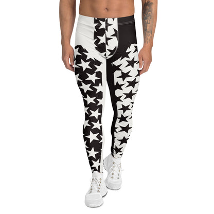 Person wearing black and white star-patterned leggings on a white background