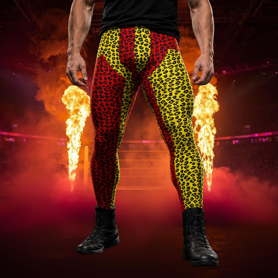 Person wearing colorful red and yellow leopard print wrestling tights with alternate split inset design with a fiery background