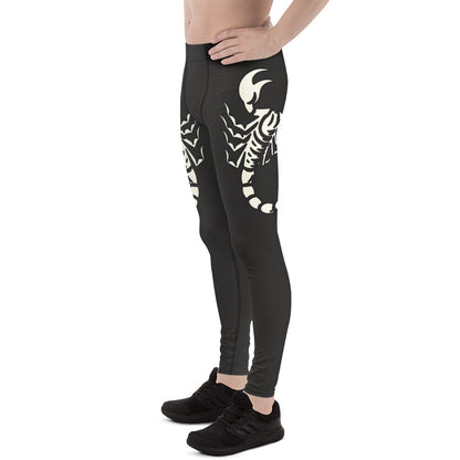 Man wearing black leggings with scorpion design in white.