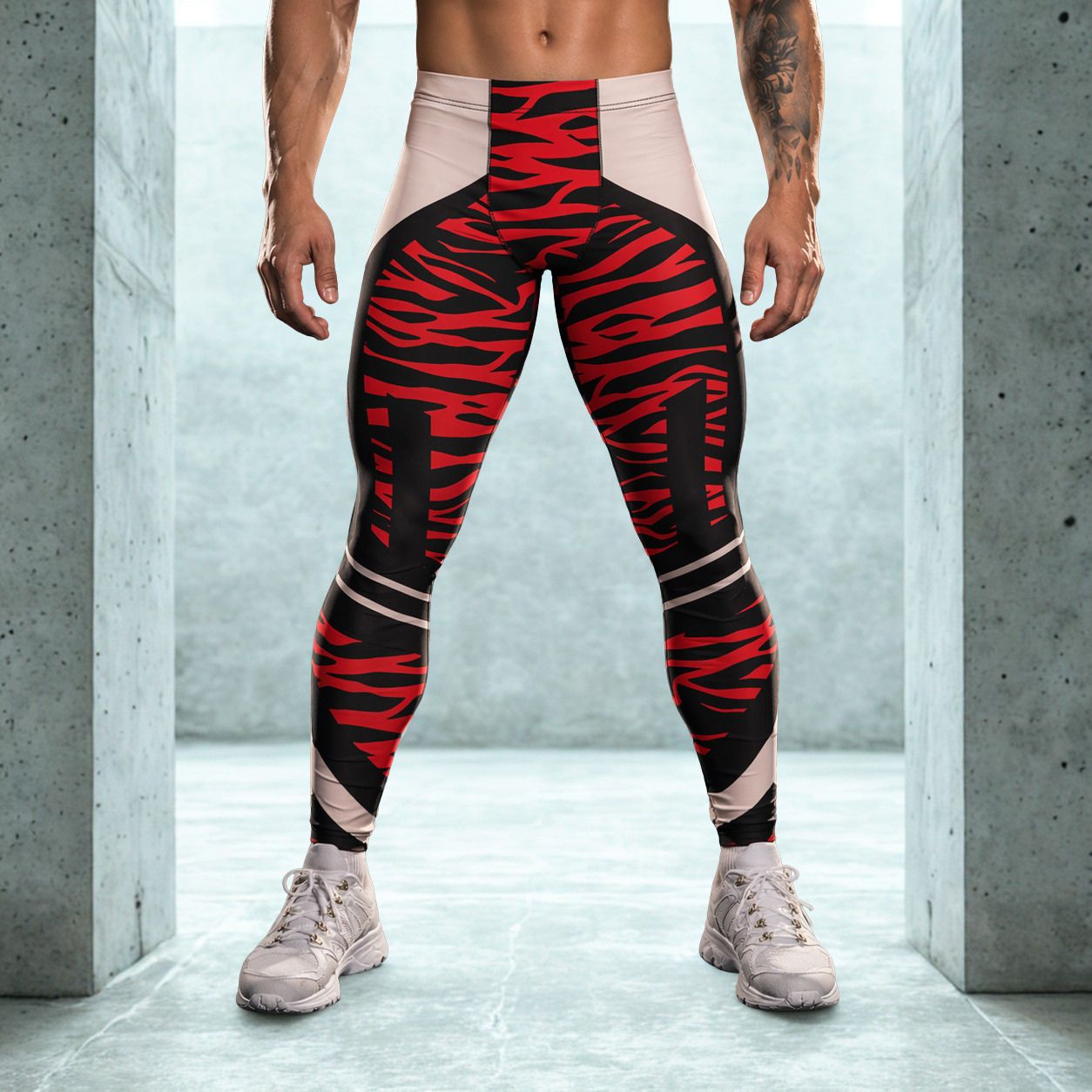 Person wearing red and black zebra pattern leggings in a concrete hallway.
