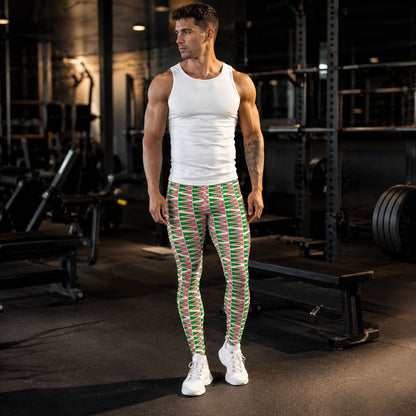 Man in gym wearing green and salmon geometric leggings with a white tank top